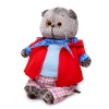 in a red jacket and plaid trousers