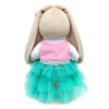 Zaika Mi in a bomber jacket and skirt