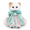 in a skirt and with a mint bow