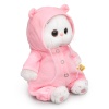 Li-Li baby in a jumpsuit with a flower