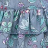 in a skirt with frills