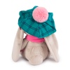 in green cap and pink scarf