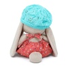 in a knitted beret