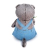 in blue overalls with a rose