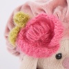 in beret with knitted flower