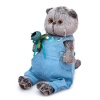 in blue overalls with a rose