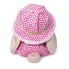 in a hat and with a bear