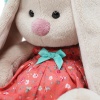 in a knitted beret