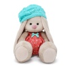 in a knitted beret