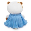 in a crinkled dress with a bow