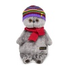 in a striped hat with a scarf