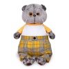 in a T-shirt and plaid pants